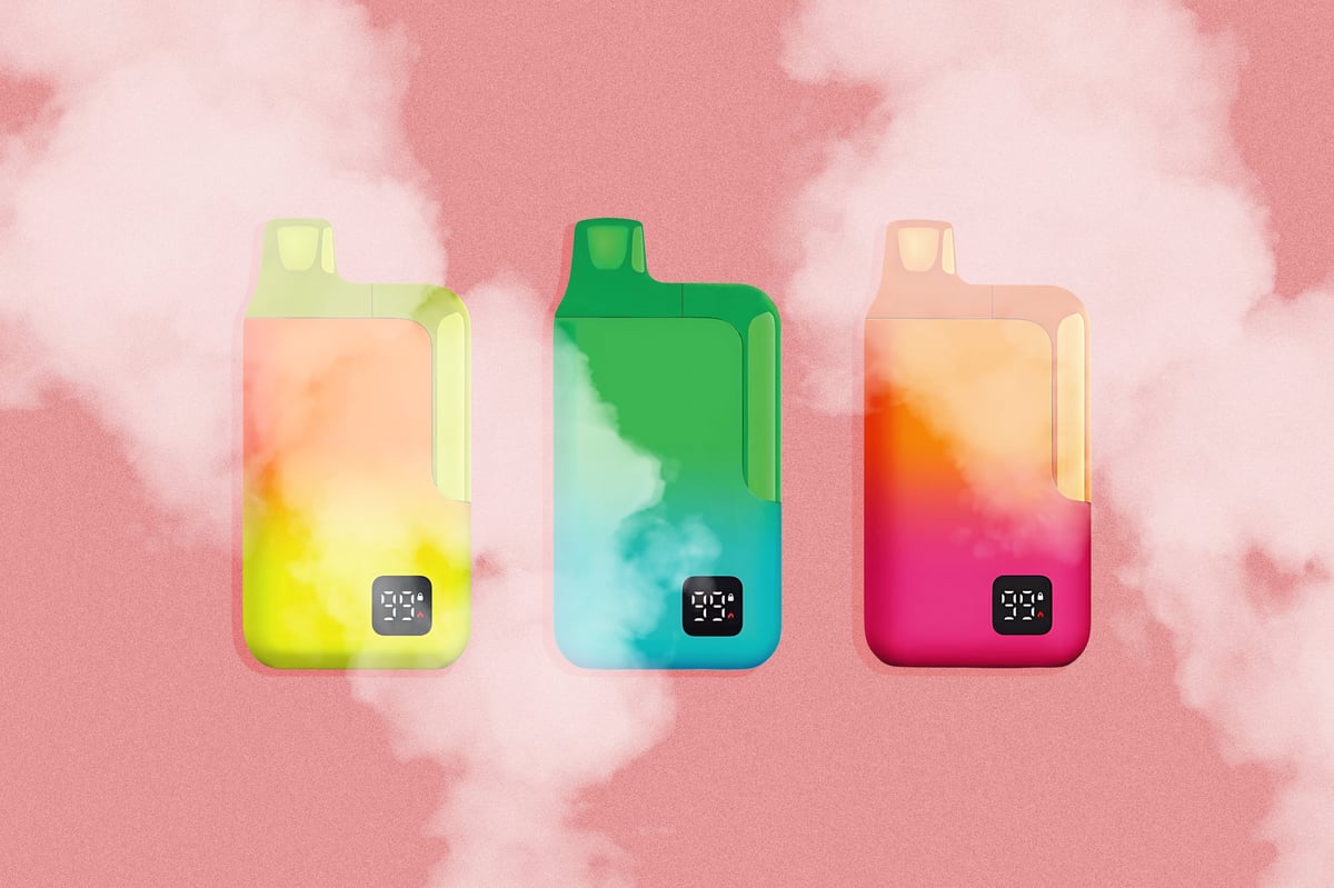 Colourful disposable cannabis vape devices on a bright pink background