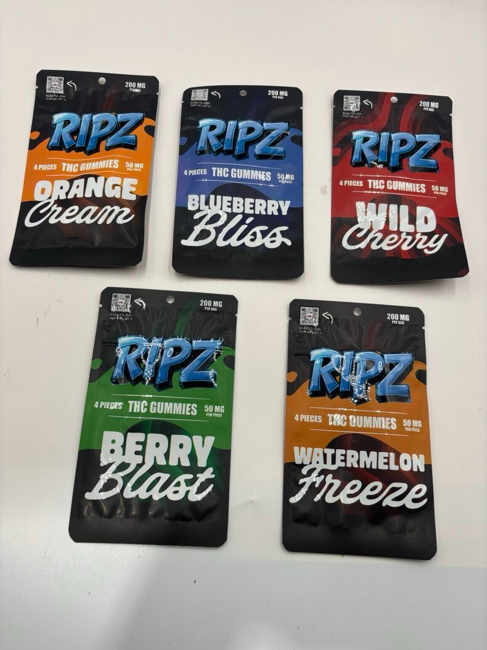 Five 200mg cannabis gummy packs in assorted flavours