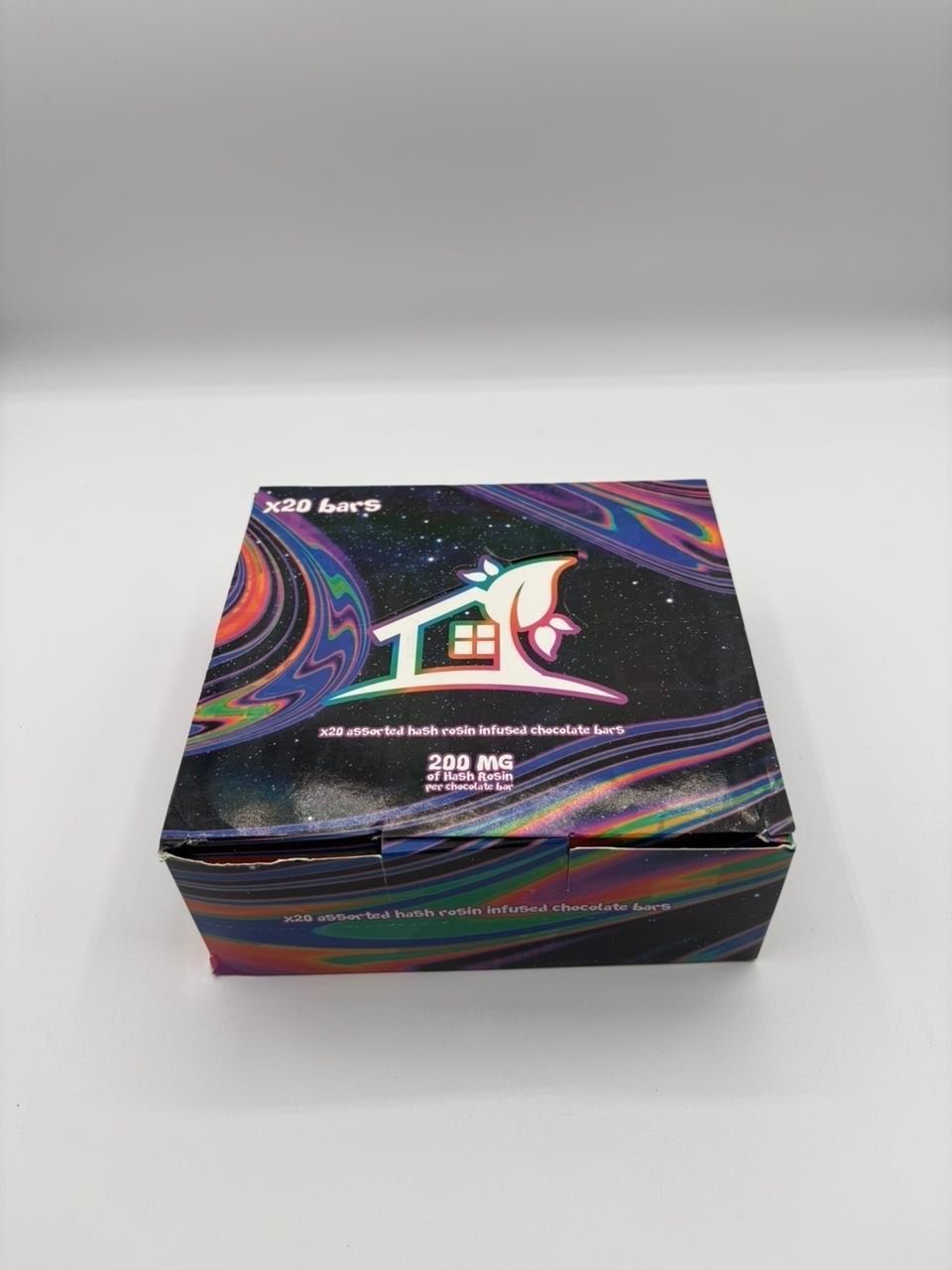 Vibrant rainbow swirl chocolate bar box on a white background