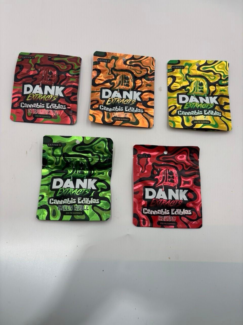 Five colourful 200mg cannabis edible packs arranged in a row