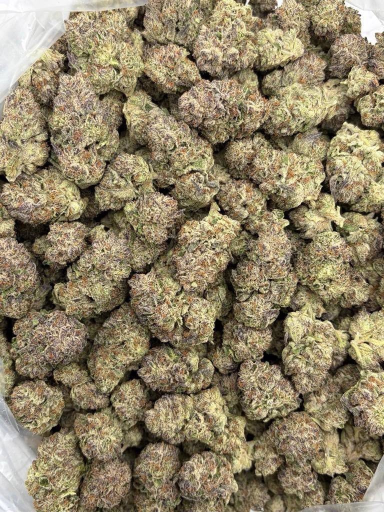 Pink Elephant cannabis buds with dense green and brown colouring